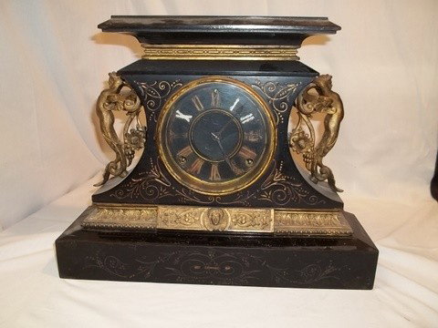 Antique Ansonia 1882 Mantle Clock Bronze W Figures: 12.5 inch antique Ansonia Clock company with bronze figures dated 1882, with pendulum, no key, rough face