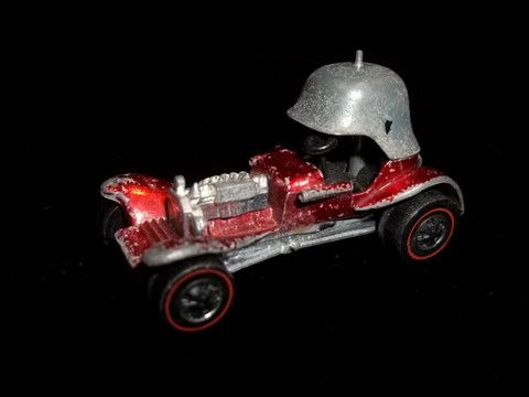 Rare 1969 Hotwheels Redline Red Baron: Rare 1969 hot wheels red line red baron with black seat, two wheels are a little chipped on inner edge, does not affect rolling, paint chipping as well.