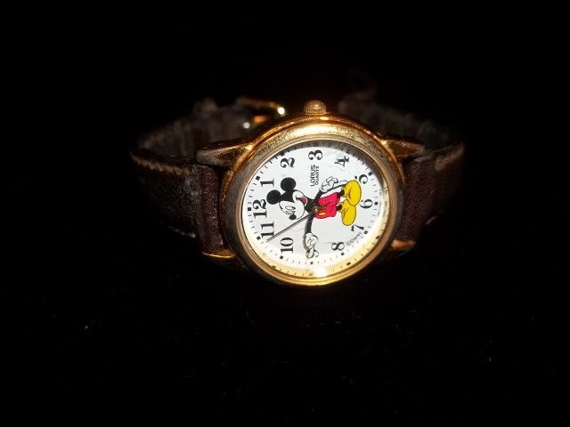 Lorus Disney Mickey Mouse Watch: Lorus Disney mickey mouse watch, watch needs battery and band is rough but watch is in good shape