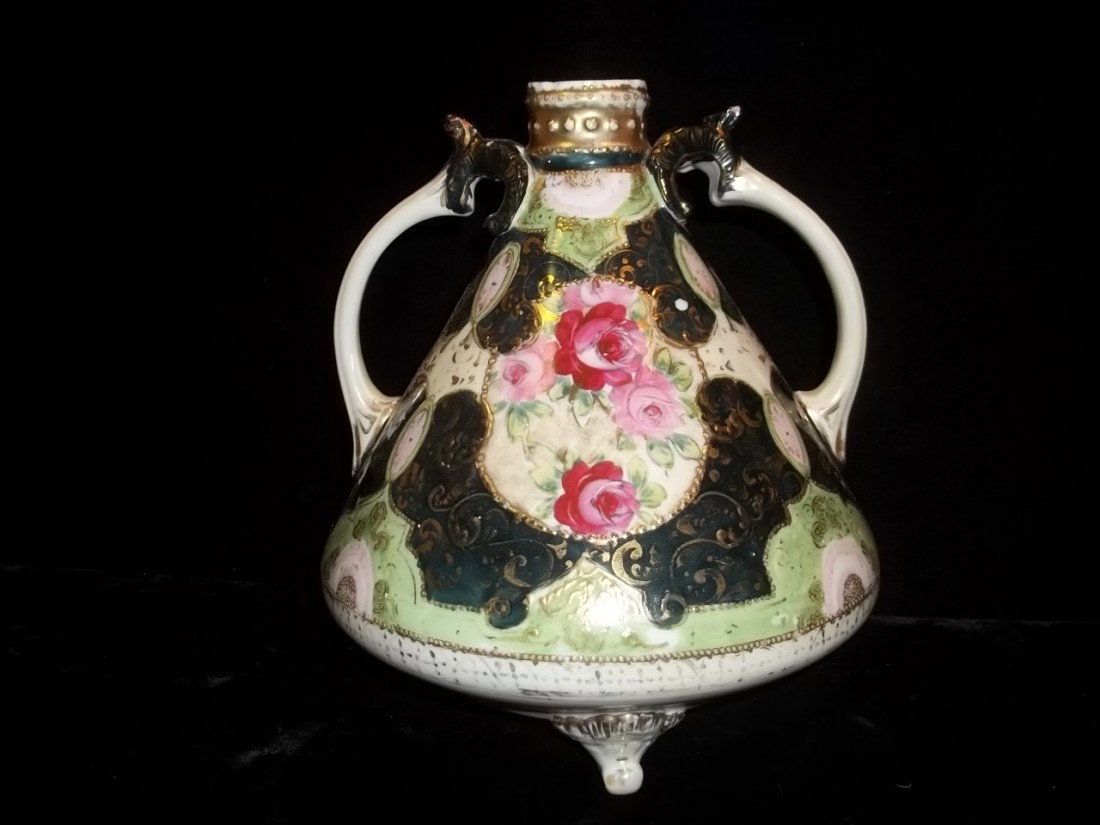 Old Hand Painted Enameled Vase: 10 inch old hand painted enameled double handle vase some paint chips, hole drilled in bottom to make a lamp