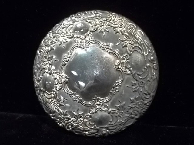 Sterling? Hand Mirror: 3.25 inch Hand Mirror, couldn’t find the mark but could be sterling silver.