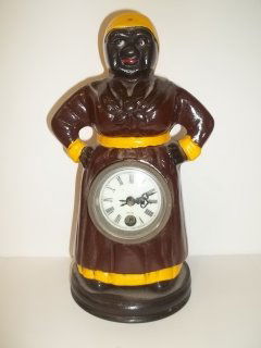 Cast Iron Mammy Moving Eye Clock: 11 inch Nice cast iron black americana mammy clock with moving eyes with the second count