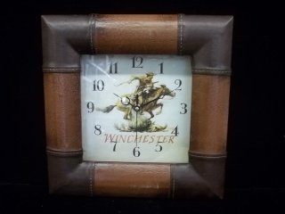 Leather Winchester Rifles Clock: works great 12 x 12 inch