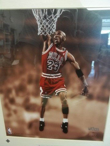 UD Authentic Michael Jordan THE DUNK /123: Great UD Authentic Michael Jordan "The Dunk," Photo Art hand numbered #d(65/123) and tagged with upper decks authentic logo stickers, showcases one of Jordans most famous dunks in photo form framed an