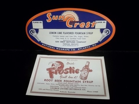 1950's Suncrest & Frostie Syrup Labels Paducah KY: Unused mint condition, purchased from estate of Paducah, KY bottler George Jacobs. Still has unused glue on backs - these were applied to the gallon syrup bottles that provided the flavor for the drin