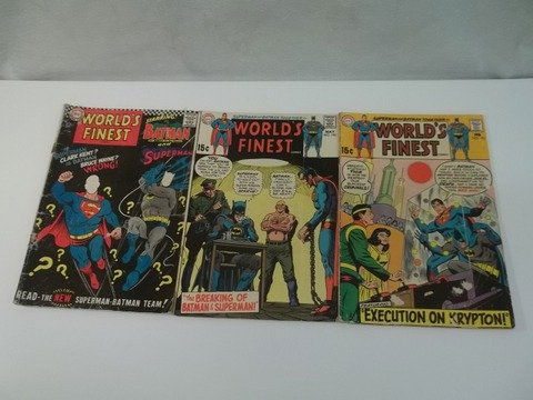 3 1960's Batman Superman Worlds Finest Comics: First comic featured in photo at the left has a coupon cut out of back cover. Other two comics are complete.