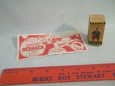 40s Superman Redback & Film Strip Box Vintage: This is a 1940s film strip box with no film, but hey, it is from the 40s! Also a Superman Tim redback $5 bill. Superman Tim redback dollars could be exchanged at the Superman Tim stores in the 1940s f