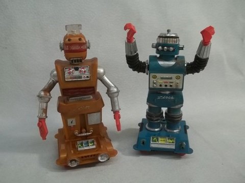 2 Old Vintage Sci-Fi Movie Toy Robots: Old, melt damage on one, not sure if they are complete or work