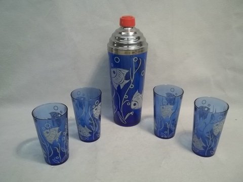 Cobalt Fish Hazel Atlas Cocktail Shaker Set 1930s: Part of the Hazel Atlas Sportsman Series produced late 30s featuring 10 1/2 inch tall cocktail shaker and complete set of matching glasses in cobalt blue with fish decor