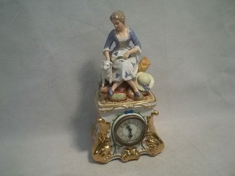 Hand painted lady w Lamb clock: 11 inch nice, works
