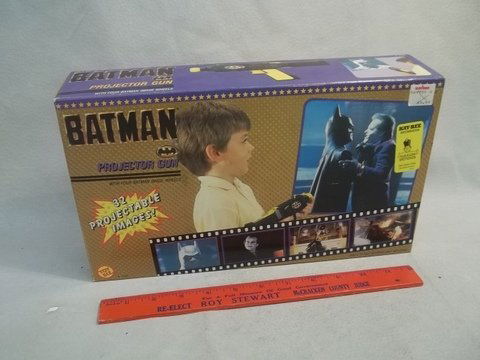 1989 Batman Movie Projector Gun MISB: Mint in sealed box, project actual images from the hit Batman Movie onto walls, ceilings etc. Kind of like the 1960s Easy-Show Projector from Kenner, but this one is hand held.