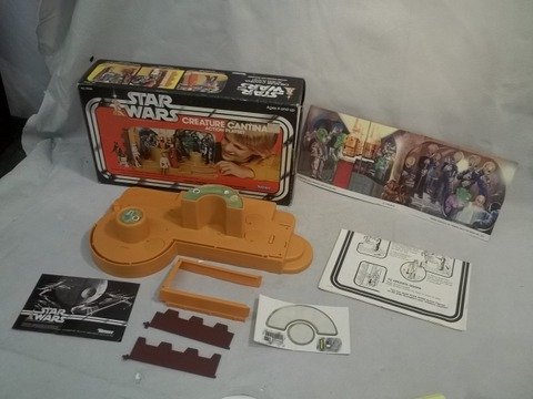 1977 Star Wars Creature Cantina Playset: Complete in box, nice condition, stickers applied by otherwise excellent and nice square no soiling C8 or so box.