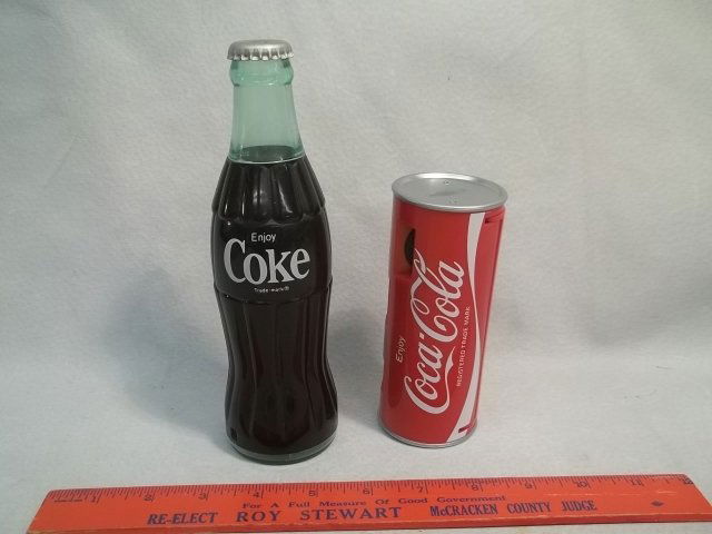 Vintage Coca Cola Radio & Camera: The coke can pops open to display a flash, the coke bottle turn bottom to turn on, turn top of bottle near cap to tune in stations