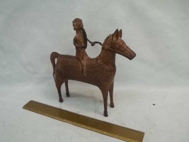 Heavy Metal Man on horse statue Inka Tribe: heavy