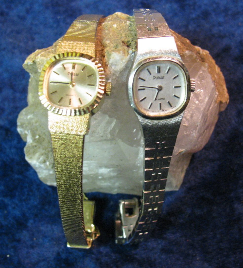 340. Gold & Silver Colored Ladies Pulsar Wristwatc: 340. Gold & Silver Colored Ladies Pulsar Wristwatches. Both appear to need batteries.
