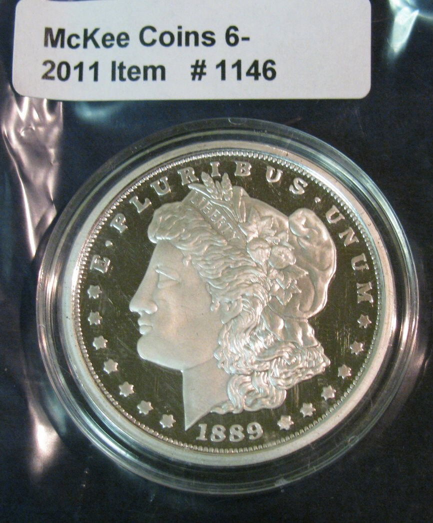 1146. 1889 CC Proof Morgan Dollar copy. Encapsula: 1146. 1889 CC Proof Morgan Dollar copy. Encapsulated.