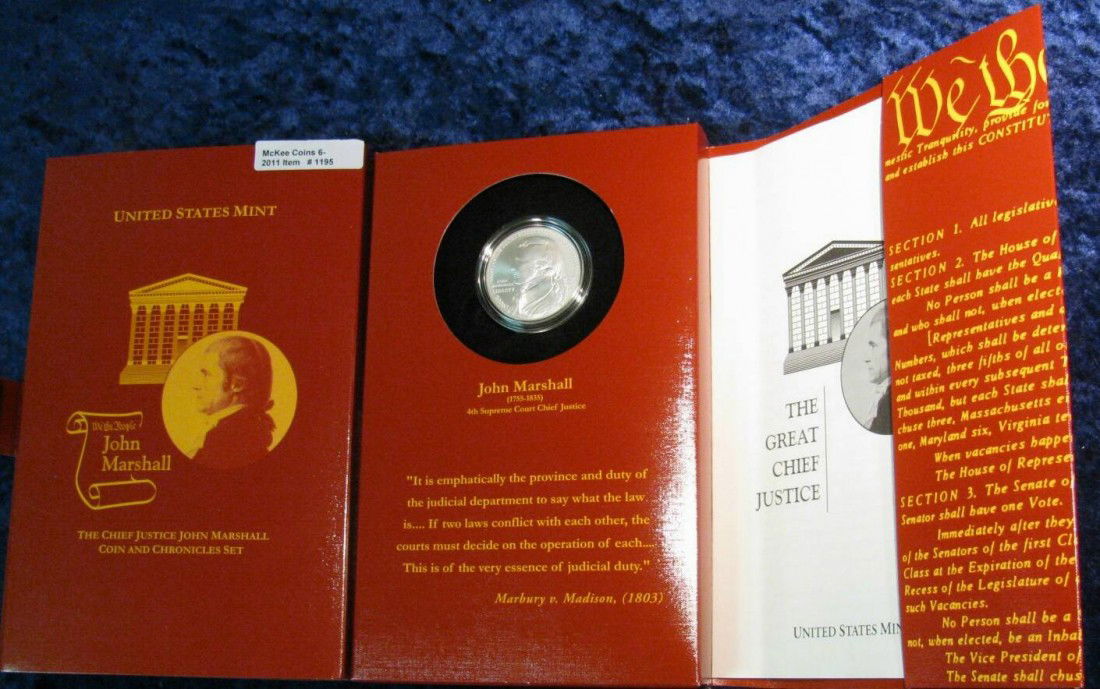U.S. Mint John Marshall Coin & Chronicles Set,: 1195. U.S. Mint John Marshall Coin & Chronicles Set. Complete with booklet and Silver Dollar.