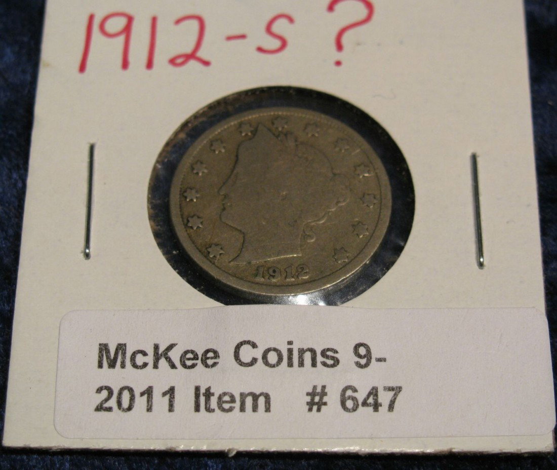 647. 1912 D or S Liberty Nickel. Big glob for a Mint ma: 647. 1912 D or S Liberty Nickel. Big glob for a Mint mark. G-4.