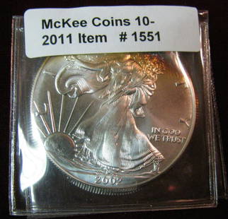 1551. 2002 One Ounce Silver American Eagle Dollar. .999: 1551. 2002 One Ounce Silver American Eagle Dollar. .999 fine. Spectacular edge toning.