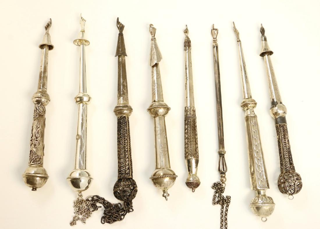 A GROUP OF EIGHT SILVER TORAH POINTERS. Various (1 of 1)