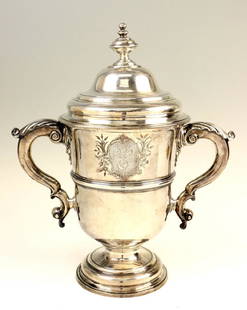 A LARGE STERLING SILVER GEORGIAN COVERED URN. London,: A LARGE STERLING SILVER GEORGIAN COVERED URN. London, 18th century. On round base with two handles and a cover. 15.5” tall.the total. weight is 117.5 ounces