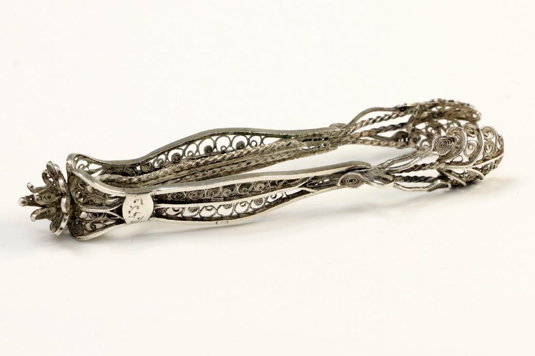 A PAIR OF SILVER TONGS BY BEZALEL. Jerusalem, 20th (1 of 1)