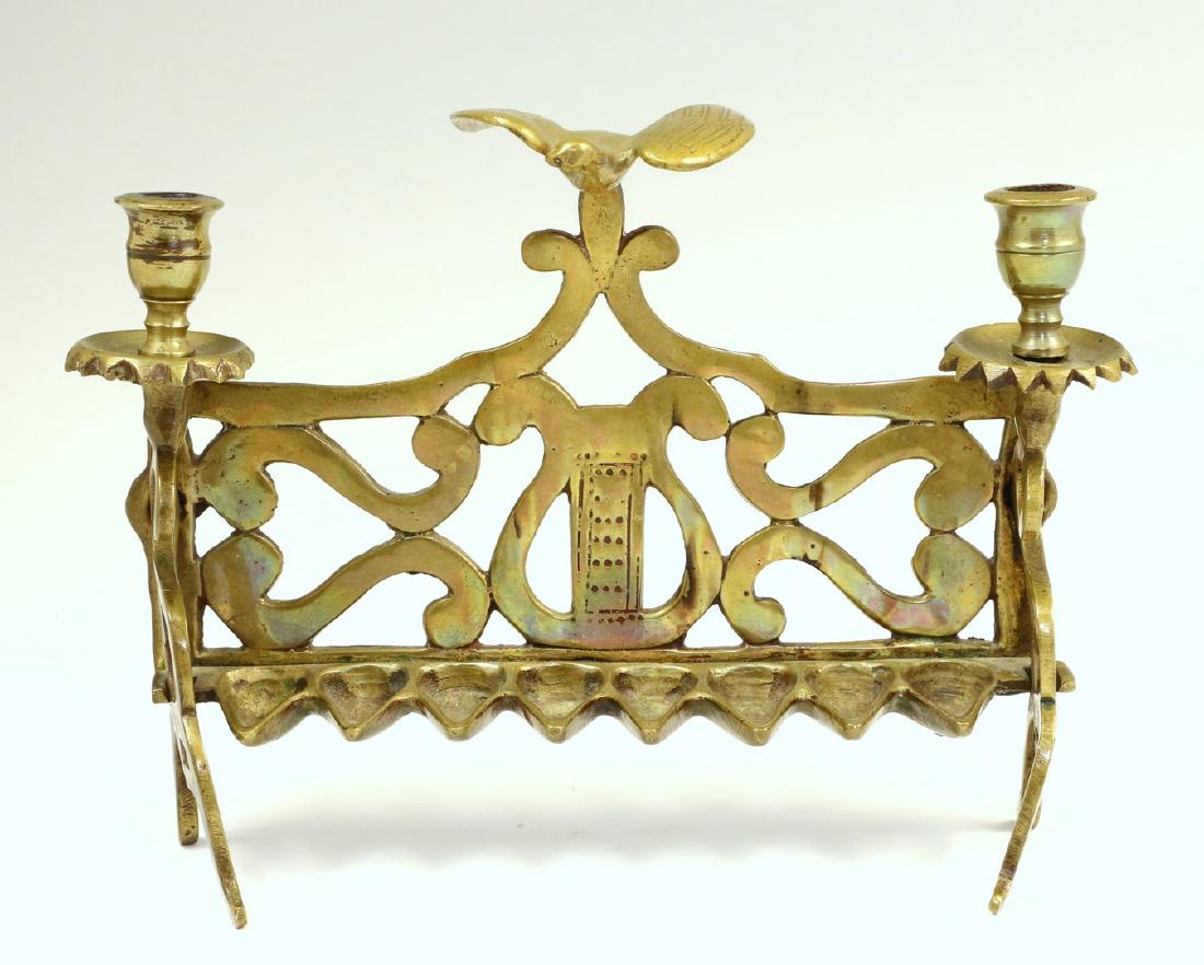 A BRASS CHANUKAH LAMP. Poland, c. 1890. On four feet (1 of 1)
