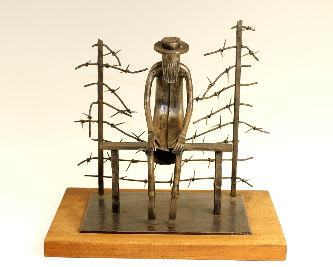 A HOLOCAUST THEMED BRONZE SCULPTURE. Signed:"HTS (1 of 1)
