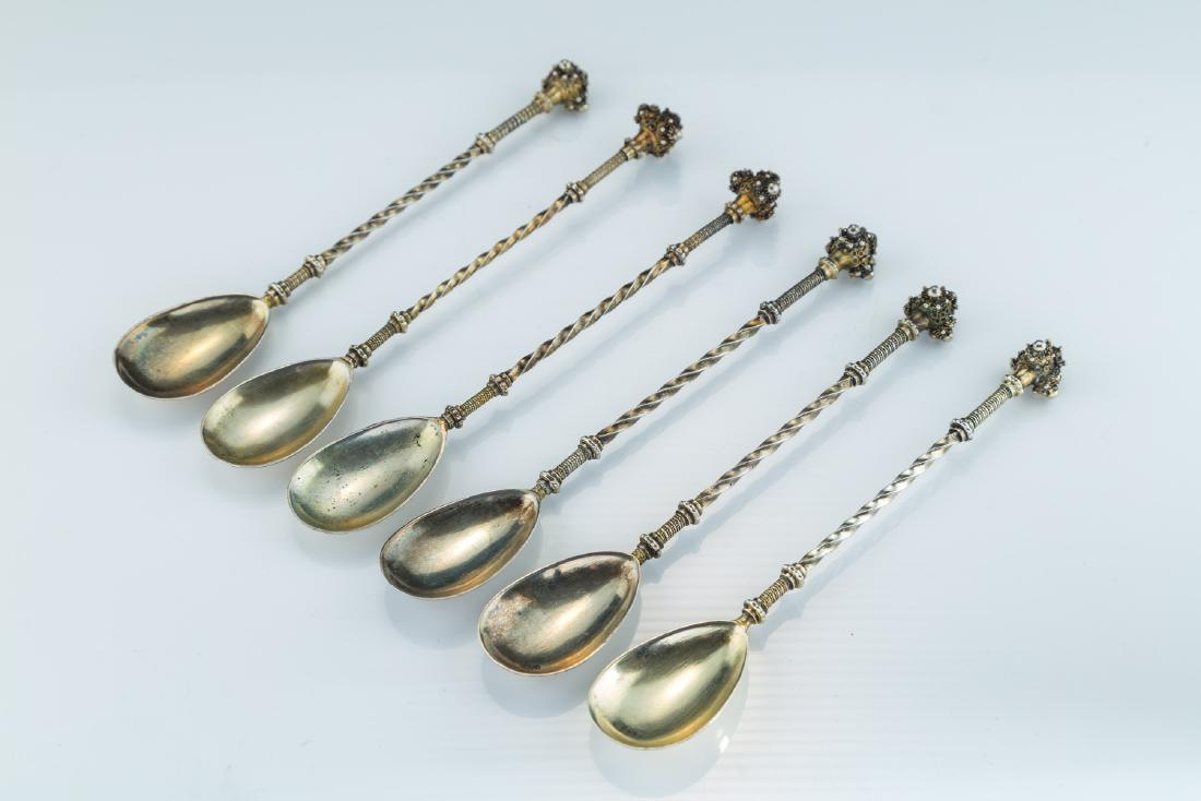 A SET OF SIX MATCHING SILVER SPOONS BY BEZALEL. (1 of 1)