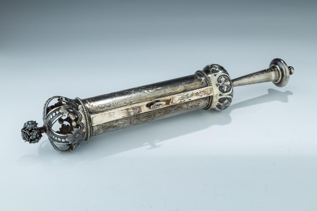 AN EARLY SILVER MEGILLAH CASE WITH ORIGINAL MEGILLAH. (1 of 1)