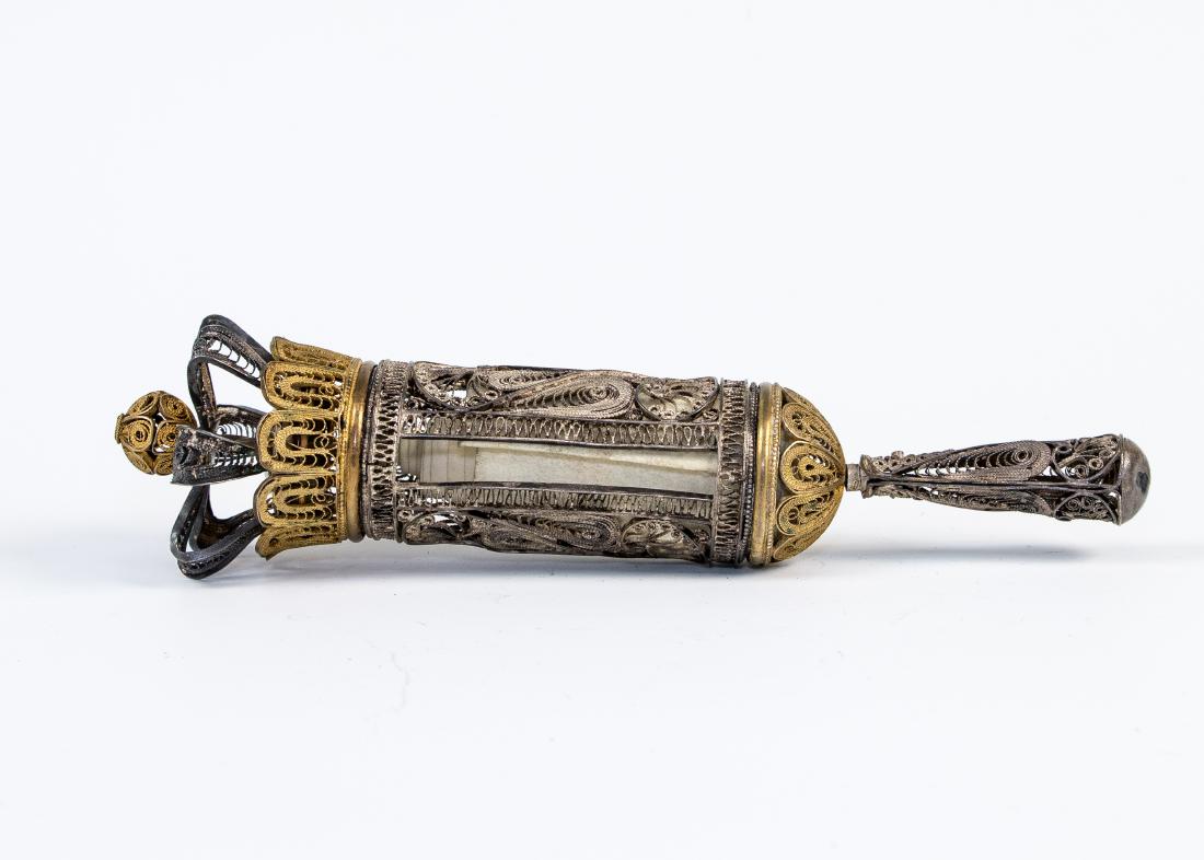 A SILVER FILIGREE MEGILLAH CASE WITH ORIGINAL MEGILLAH.: A SILVER FILIGREE MEGILLAH CASE WITH ORIGINAL MEGILLAH. Israel, 20th century. Made of hand spun filigree with traces of original gilding. Pull tab missing. 8.2” long.
