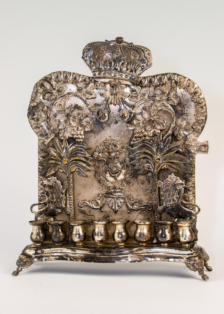 A LARGE HANUKKAH LAMP. Warsaw, c. 1890. On four claw (1 of 1)