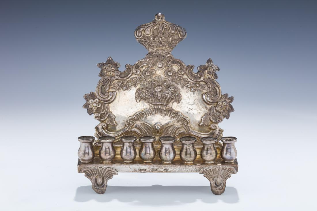 A SILVER HANUKKAH LAMP BY ABRAHAM REINER. Warsaw, 1860. (1 of 1)