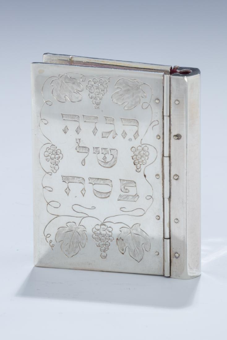 A SMALL STERLING SILVER BOUND HAGADDAH BY SHUKI (1 of 1)