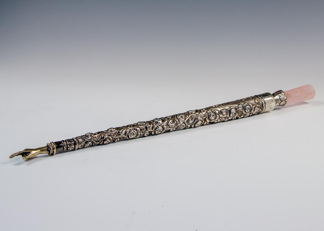 . A MASSIVE SILVER AND ROSE QUARTZ TORAH POINTER. (1 of 1)