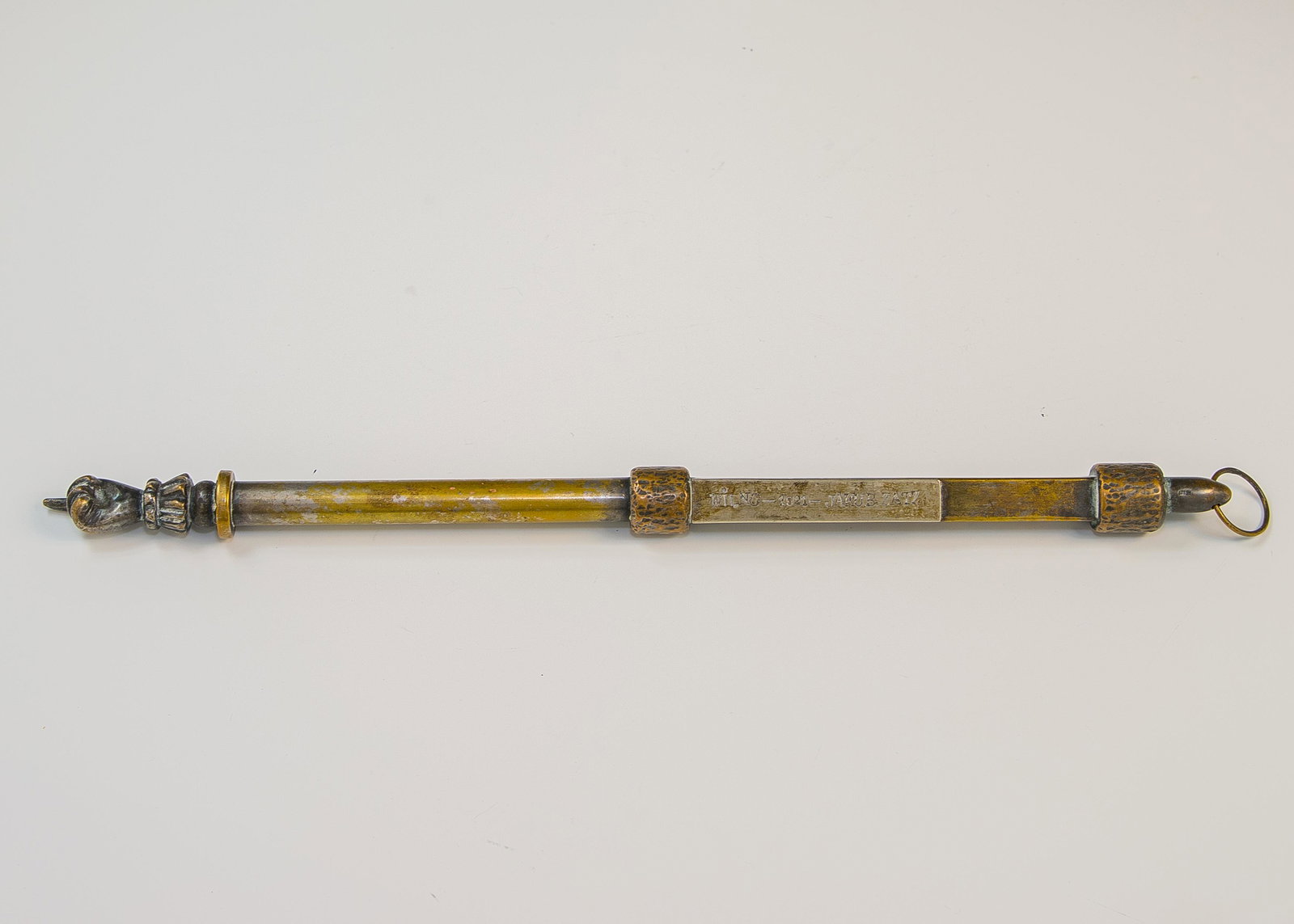 85. A LARGE BRASS TORAH POINTER. Vilna, 1921. Tubular (1 of 1)