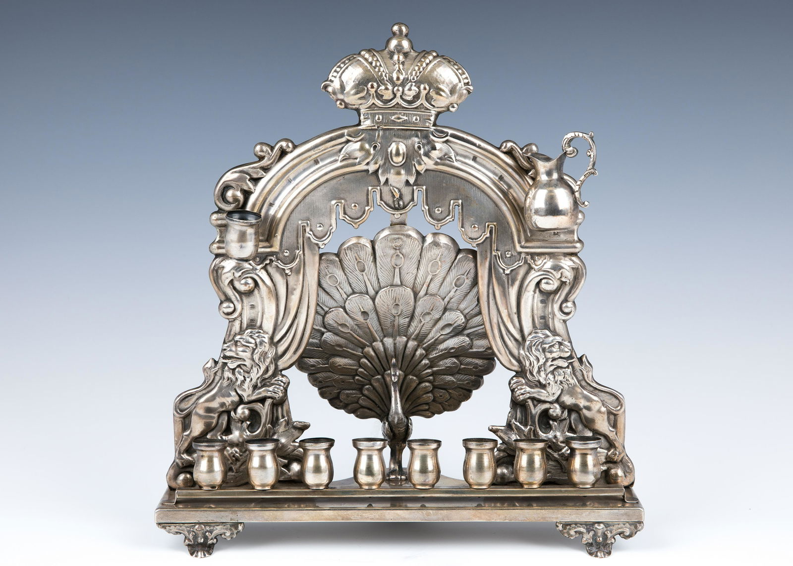 A LARGE PEACOCK SHAPED HANUKKAH LAMP. Austria, c. 1900. (1 of 1)