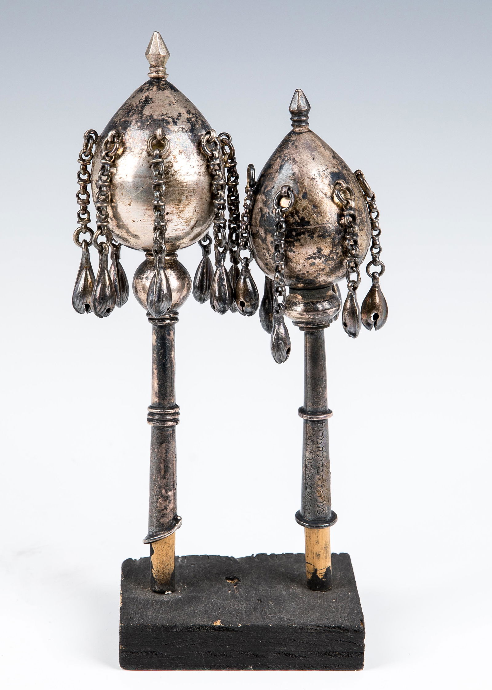 TWO SILVER TORAH FINIALS. Iraq, 19th century. On thin (1 of 1)