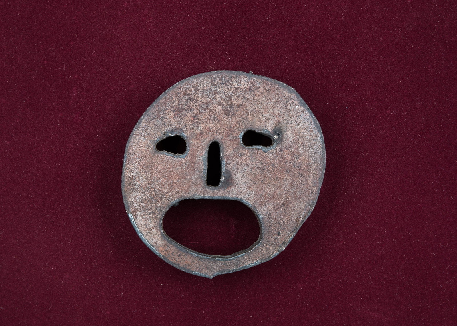 A SCULPTURE BY MENASHE KADISHMAN. Israel, c. 1990. Of a: A SCULPTURE BY MENASHE KADISHMAN. Israel, c. 1990. Of a human face. 5.5" diameter