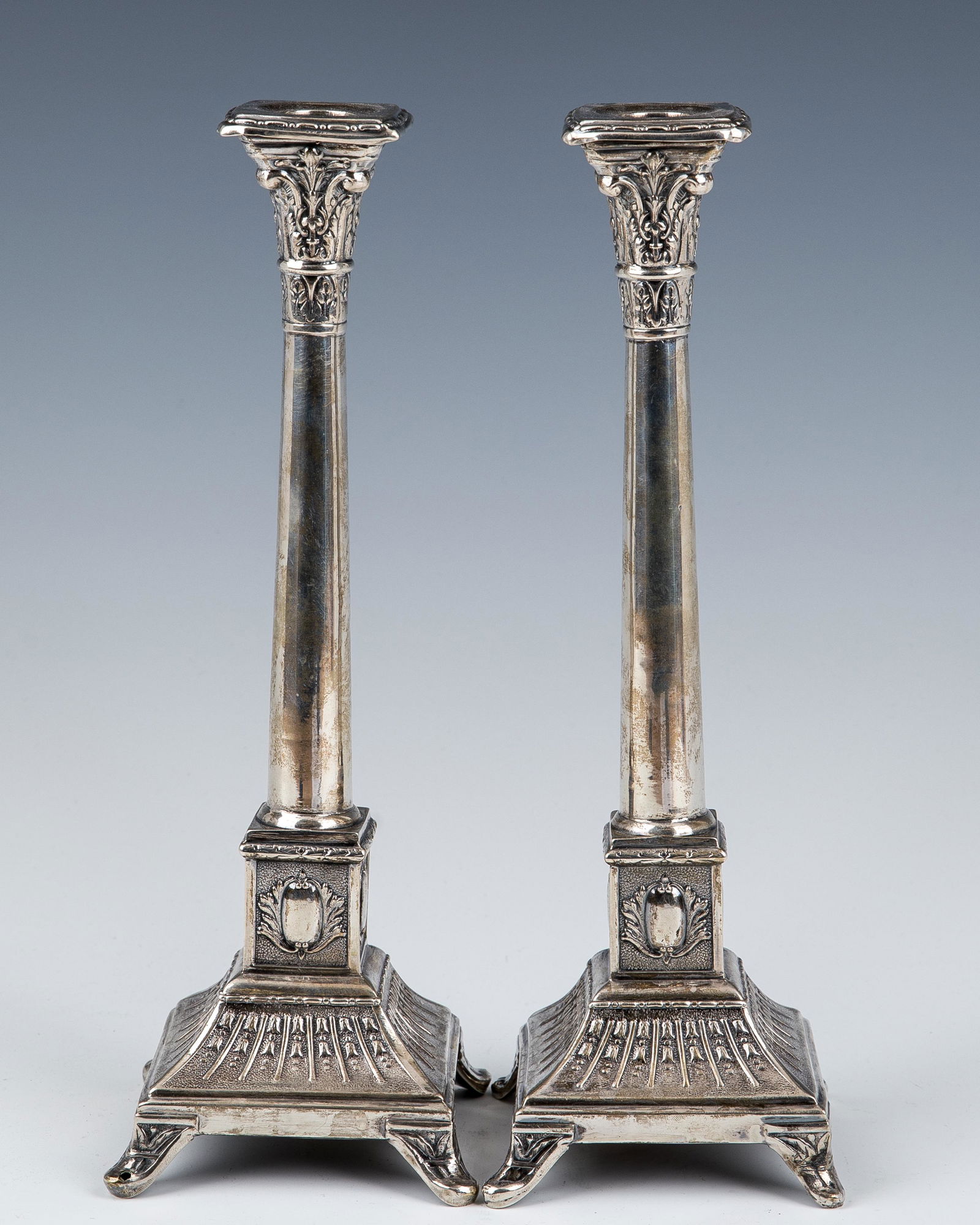 A PAIR OF SILVER CANDLESTICKS. Poland, c. 1920. Each on (1 of 1)