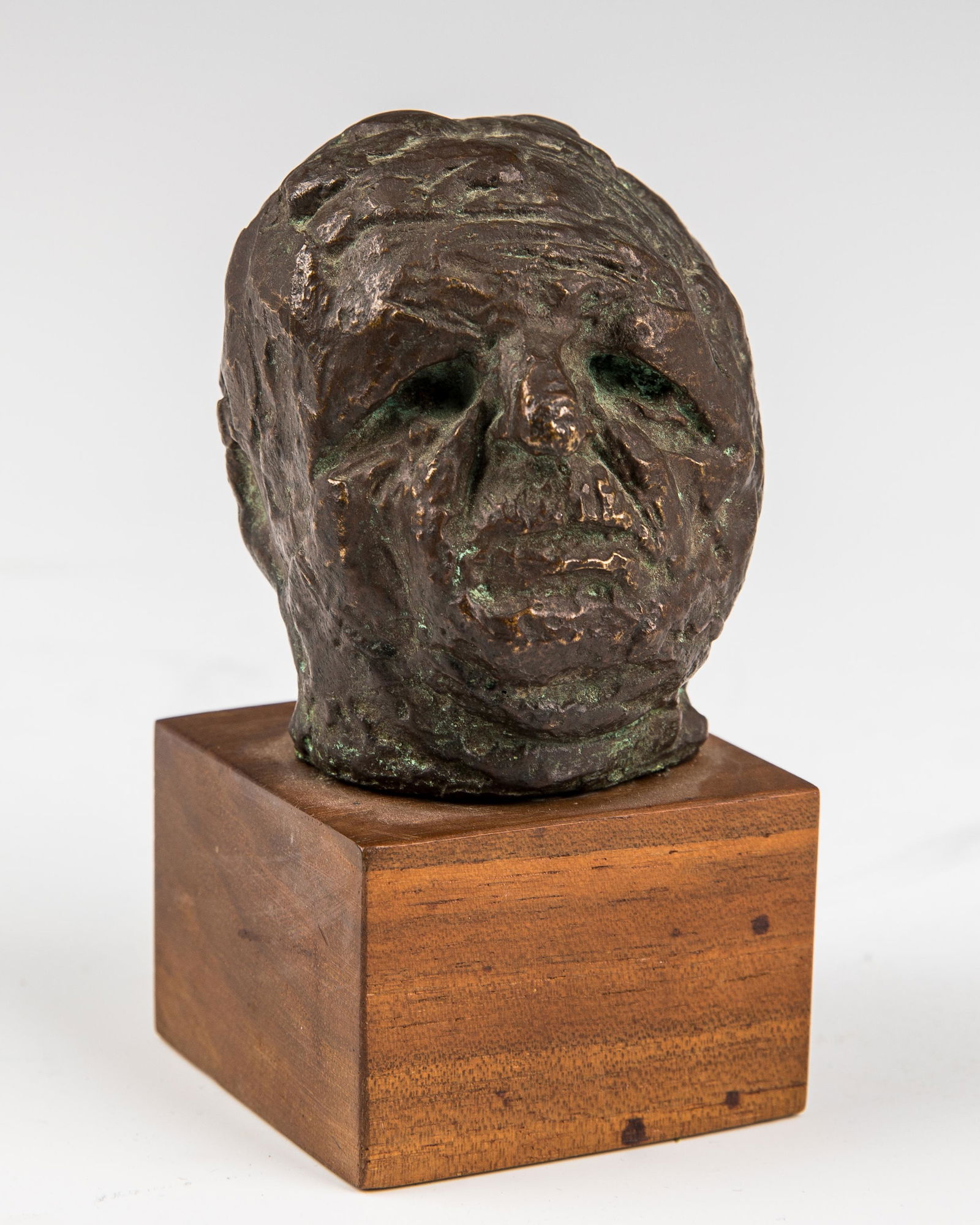 A BRONZE SCULPTURE OF A HEAD BY JAMES KEARNS. American, (1 of 1)
