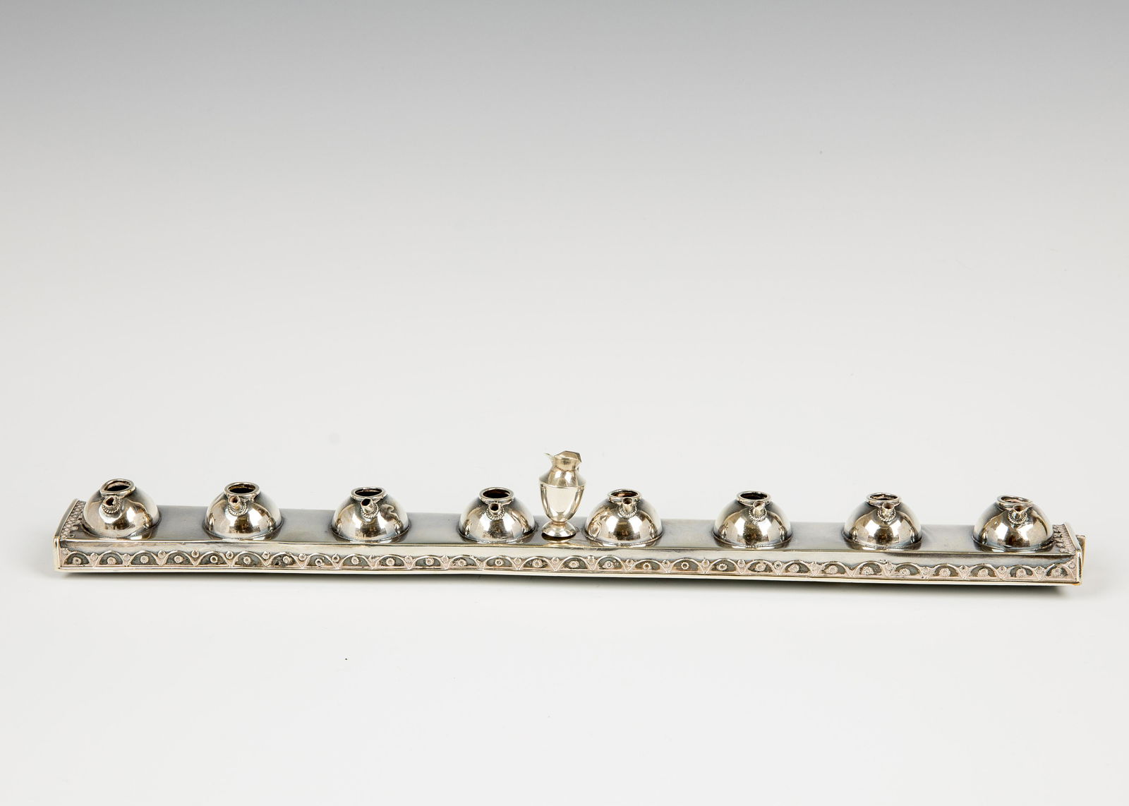 21. A STERLING SILVER MENORAH TOP BY THE BEZALEL (1 of 1)