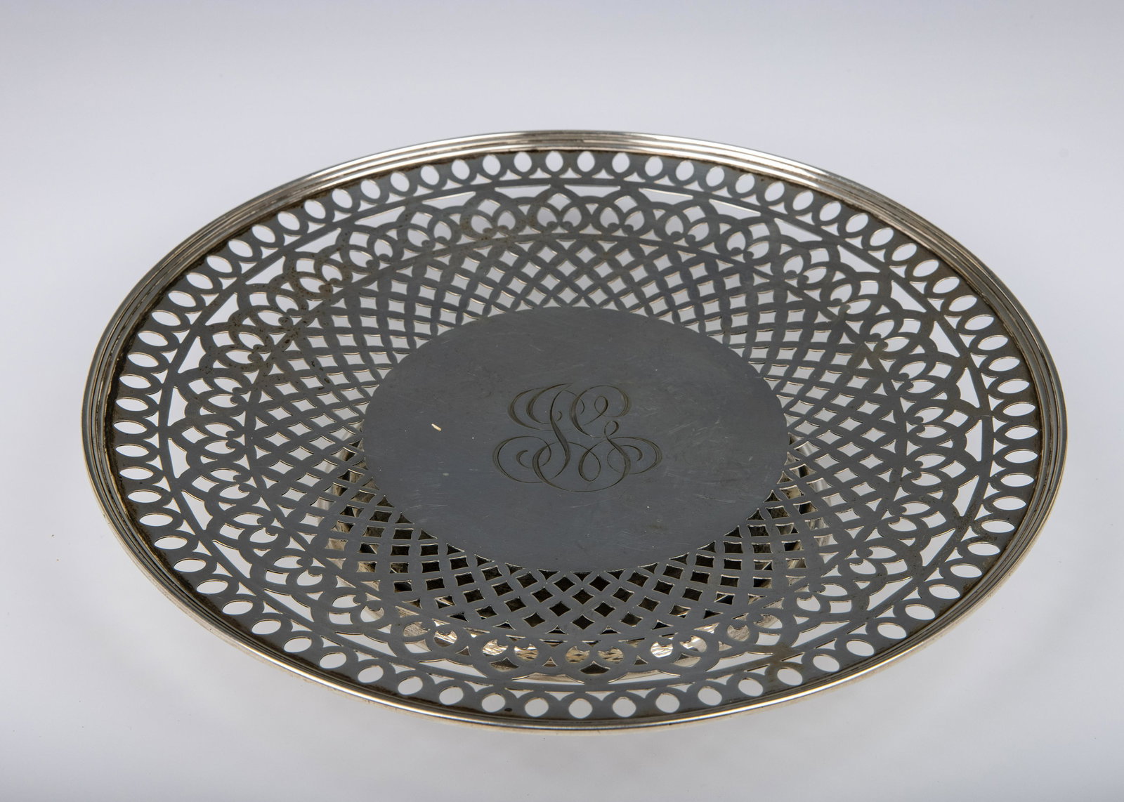 A LARGE STERLING SILVER FOOTED PLATTER BY REED AND (1 of 1)