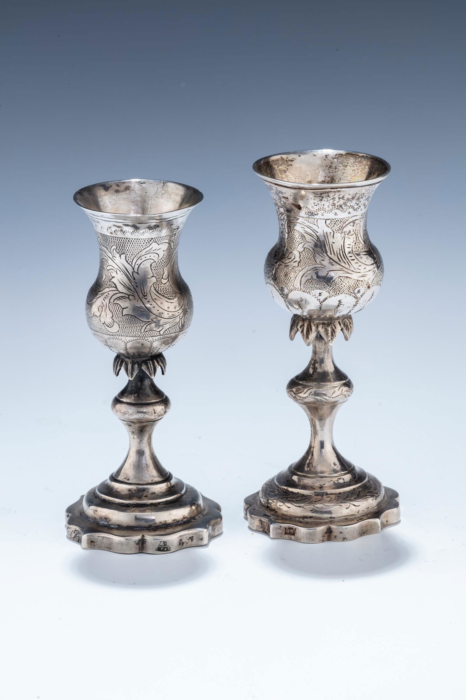 A PAIR OF SILVER KIDDUSH GOBLETS.  Vilna, c. 1866. (1 of 10)
