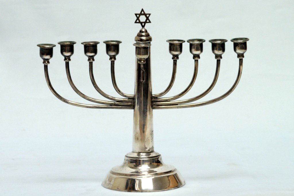 A SILVER MENORAH.: Germany, c. 1910. Of classical temple form. Marked 800 crown and moon. 6.5 troy ounces, 9.5" wide.
