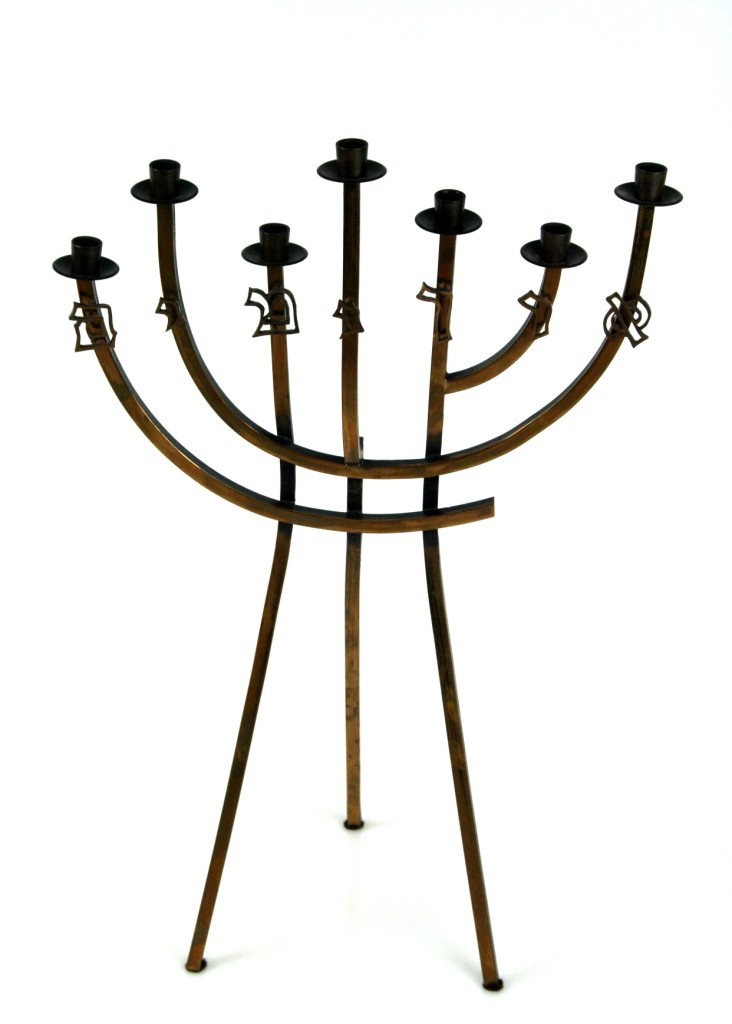 A BRONZE JUDAICA SCULPTURE BY LUDWIG WOLPERT.: A JUDAICA BRONZE SCULPTURE BY LUDWIG WOLPERT. New York, c. 1960. For use on the Sabbath. The writing translates to "Light of Days". 16" tall.