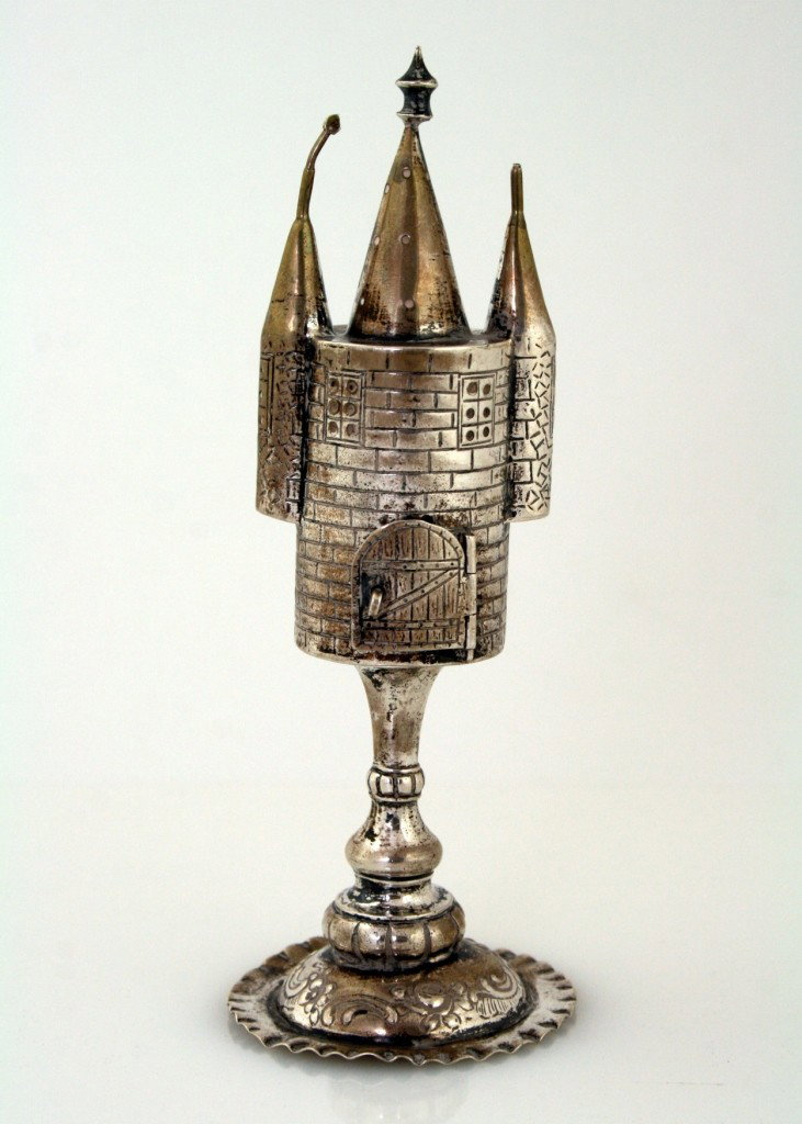 A SILVER SPICE TOWER. Germany, c. 1890. Of castle s: A SILVER SPICE TOWER. Germany, c. 1890. Of castle shape. On round base. Marked 800 crown and moon. Lacking flags. 6.9" tall.