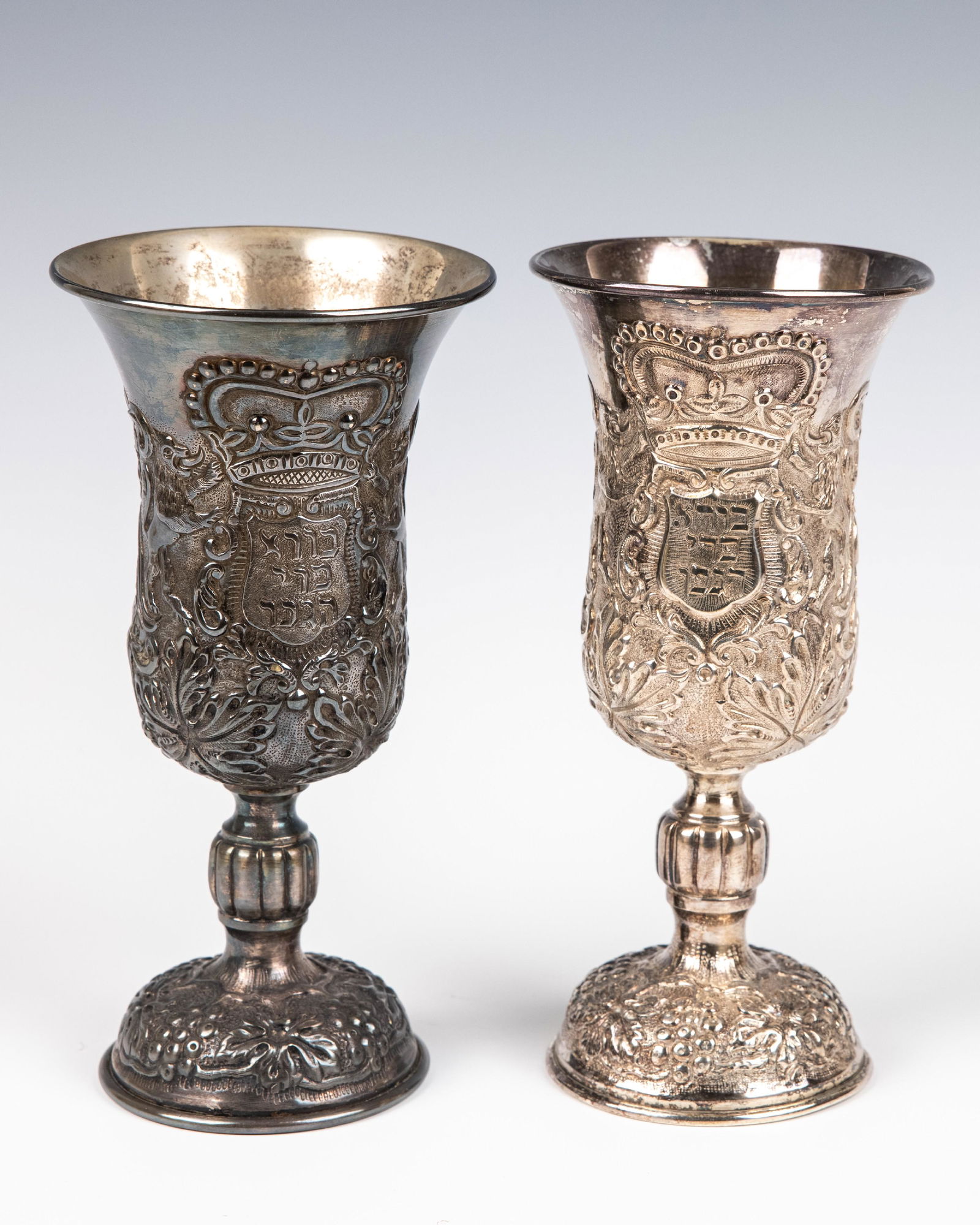 TWO LARGE 835 SILVER KIDDUSH GOBLETS. Continental, 20th century. Each embossed with grapevine leaf (1 of 1)