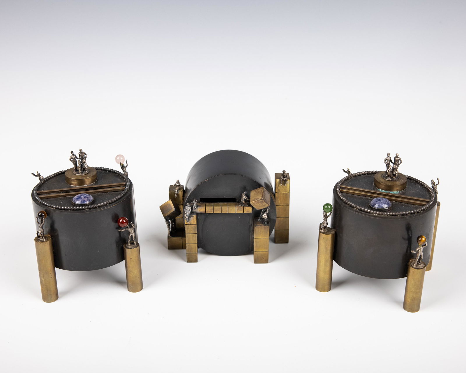 THREE HANDMADE CHARITY CONTAINERS BY WINGED CAMEL. Twentieth century. In arts and crafts form. 4" (1 of 1)