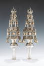 A RARE AND IMPORTANT PAIR OF SILVER TORAH FINIALS